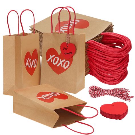 PRICES MAY VARY. Valentine's Day Gift Bags:The set of Valentine’s Day Gift Bags included 30 pieces Valentine Day craft bags, 30 heart shaped gift tags, 30 red white cord,pattern elements provide a strong holiday atmosphere,making it super ideals to hold special presents for Valentine's holiday. Gift Bags’ Size:A good Valentine's Day paper gift bag option.Each Valentine heart favor bags measure approx. 6" wide x 8.2" tall x 3.2" deep,heart tag is about 5.5 x 6.5 cm/ 2.1x 2.5 inches.These Valentin Kraft Paper Gift Wrapping, Valentines Day Gift Bags, Valentine Candy Bags, Special Presents, Valentines Candy, Pattern Elements, Paper Gift Wrapping, Love Party, Goody Bags