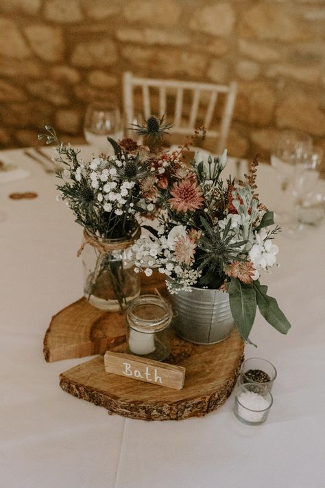 Flowers Watering Can Pink Greenery Thistle Astilbe Centerpiece Log Rustic Table Barn Upcote Wedding Siobhan Beales Photography #Flowers #WateringCan #Pink #Greenery #Thistle #Astilbe #wedding #centrepiece #log #rustic #table Wedding January, Rustic Wedding Table, Wedding Floral Centerpieces, Rustic Wedding Centerpieces, Whimsical Wonderland Weddings, Wedding Rustic, Wedding Table Decorations, Wedding Flower Arrangements, Wedding Table Centerpieces