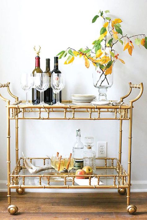 This Brass Bamboo Bar Cart is practically made for your home! Complete with bartending essentials—like liqueurs, summer decorations, and your favorite wine—this decorative and practical piece makes entertaining easy by keeping you prepared for all party occasions. Brass Bar Cart, Diy Bar Cart, Gold Bar Cart, Outside Bars, Bar Cart Styling, Bar Designs, Beautiful Bars, Bar Cart Decor, Plywood Furniture