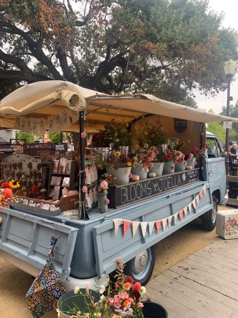 Small Town Witch Aesthetic, Rural Small Town Aesthetic, Farmers Market Building, Small Town Event Ideas, Vintage Flower Truck, Small Town Festival Aesthetic, Small Town Shops Aesthetic, Farmer’s Market Aesthetic, Small Town Flower Shop