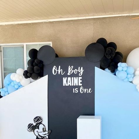 Balloons By Bryan  ◡̈ on Instagram: "Oh Boy! Kaine is One✨" Mickey Balloon Arch, Mickey Mouse Birthday Party Ideas 1st Black And White, Monochrome Mickey Mouse Birthday, Monochromatic Mickey Mouse Party, Blue Mickey Mouse Party 1st Birthdays, Mickey First Birthday Invitations, Blue Mickey Mouse, Mickey Mouse Birthday Decorations, Birthday Lights