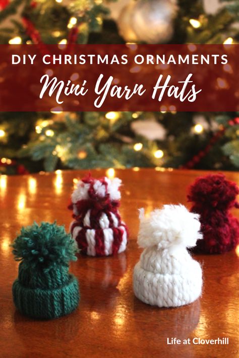 Mini Yarn Hat Christmas Ornaments - Life at Cloverhill Mini Winter Hat Tree Ornament, How To Make Mini Yarn Hats, Yarn Toque Ornament, Tiny Knit Hat Ornament, Mini Beanie Hats, Snowman Hat Ornaments Diy, Mini Bobble Hat Decorations, Yarn Winter Hat Ornaments, Mini Winter Hats Diy