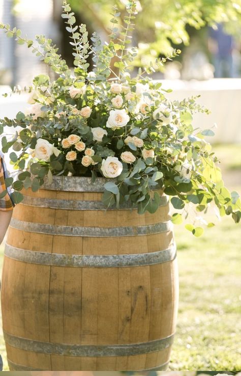 Blush and greenery whiskey barrel wine barrel flower arrangement Wine Barrel Flower Arrangements, Wine Barrel Wedding, Barrel Flowers, Barrel Wedding, Flowers Wine, Aisle Flowers, Barrel Planter, Wine Barrels, Wedding Ceremony Flowers