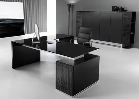 Choose an all black design to create a sleek and stylish atmosphere in your office. Black glass desk tops with matt black lacquered structures. Black Glass Desk, Glass Office Desk Modern, Home Office Uk, Black Office Furniture, Black Desk Office, Executive Office Furniture, Modern Bureau, Office Desk Designs, Glass Desk Office