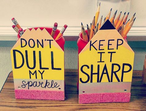 My new sharp and dull containers for my pencil cups in my art classroom. Students do a trade in system, they trade me a dull or broken pencil for a sharp one. I used the pencil banner I found at the Target Dollar Spot. IG: @rainbow.art.teacher Pencils Classroom Theme, Pencil Theme Classroom Ideas, Pencil Classroom Decor, Pencil Themed Classroom Decor, Classroom Decor Pencil Theme, Art Teacher Supplies Elementary Schools, Pencil Quotes, Diy Teacher Pencil Sign, Broken Pencil