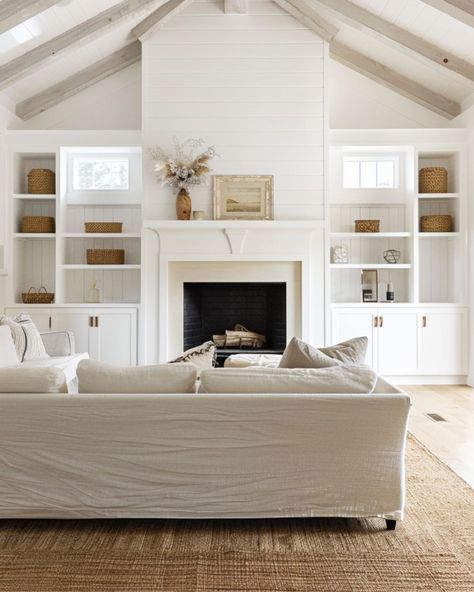 This living room totally captures the modern farmhouse vibe I love! With its vaulted ceilings and shiplap walls, it feels open and airy, but still super cozy. The built-in shelves around the fireplace? Such a great way to add a personal touch with your favorite decor, while keeping everything organized. I’m all about the mix of soft neutrals and textured accents that give the space warmth without feeling cluttered. Plus, with those big windows letting in all that natural light, it’s the perfe... Built In Shelves Living Room Fireplace With Windows, Built In Tv Wall Unit Vaulted Ceiling, Living Room Fireplace With Windows, High Vaulted Ceilings Living Room, Fireplace With Vaulted Ceiling, Fireplace With Windows, Shelves Around Fireplace, Built In Tv Wall Unit, Cathedral Ceiling Living Room