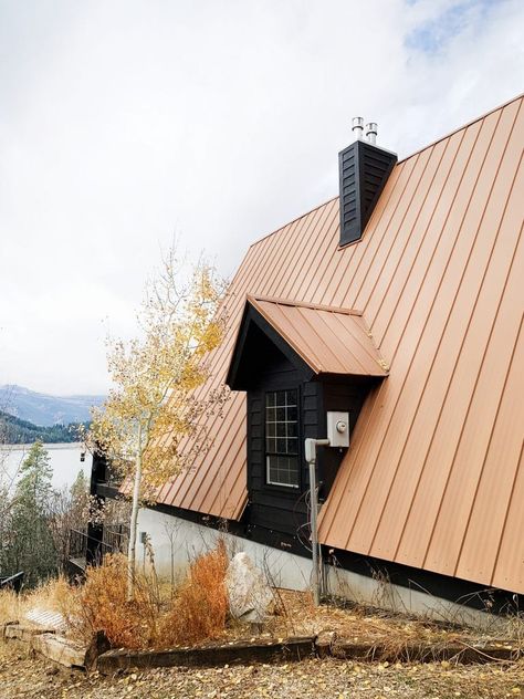 Our Freshly Painted Black A-Frame - Chris Loves Julia Copper Metal Roof House Exterior Colors, Cabins With Metal Roofs, Black House Metal Roof, Black House Copper Roof, Copper Roof House, Rustic Mcm, Copper Metal Roof, A-frame Interior, Metal Roof Houses