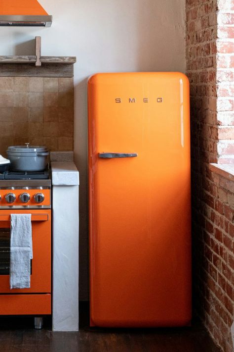 The iconic Smeg 50's retro aesthetic FAB fridge. With an incredible colour-popping range of hues and variety of sizes - you can find the perfect match to suit your style and elevate your space.

#AtHomeWithSmeg #SmegFridge #SmegColourfulFridge #OrangeKitchen Red Smeg Fridge, Vintage Style Fridge, Smeg Fridge Aesthetic, Orange Smeg Fridge, Contempary Kitchen, Smeg Fridge Kitchen, Colourful Fridge, Smeg Green, Orange Green Kitchen