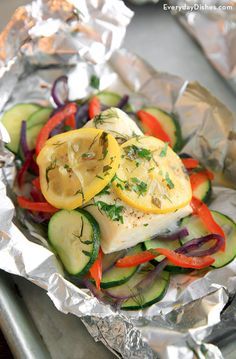 Ease the kids into a fish dinner with these easy halibut and veggie foil packets! They’re mild-tasting, quick, easy to make and can even be made ahead of time. Veggie Foil Packets, Grilled Halibut Recipes, Fish And Veggies, Foil Packet Dinners, Grilled Halibut, Foil Dinners, Halibut Recipes, Foil Packet Meals, Foil Packet