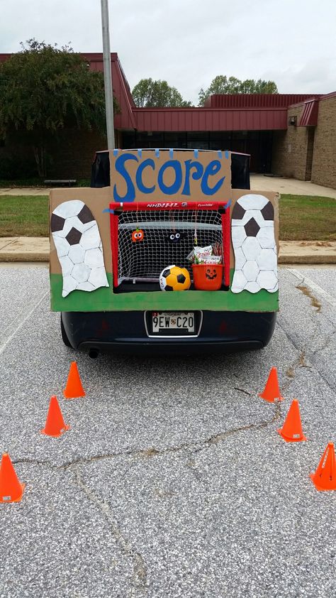 Soccer trunk or treat for preschool Soccer Theme Trunk Or Treat, Trunk Or Treat Soccer Theme, Sports Theme Trunk Or Treat, Trunk Or Treat Basketball Theme, Sports Themed Trunk Or Treat Ideas, Trunk Or Treat Sports Theme, Soccer Trunk Or Treat, Sports Trunk Or Treat Ideas, Soccer Trunk Or Treat Ideas