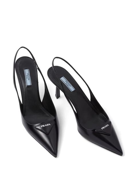 Prada's slingback pumps honour the Italian brand's minimalist design sensibility. Set on a mid heel, this black brushed-leather pair is solely decorated with the house's iconic triangle logo. Highlights black leather enamel triangle logo branded leather insole slingback strap pointed toe mid heel Made in Italy. Gender: WomenProduct ID: 1I901MF075055F0002*Import tax/duty will be calculated at checkout (If applicable) Summer Triangle, Women High Heels, Luxury Footwear, Elegant Branding, Triangle Logo, Dress Shoes Womens, Slingback Pump, Mid Heel, Wedding Party Dresses