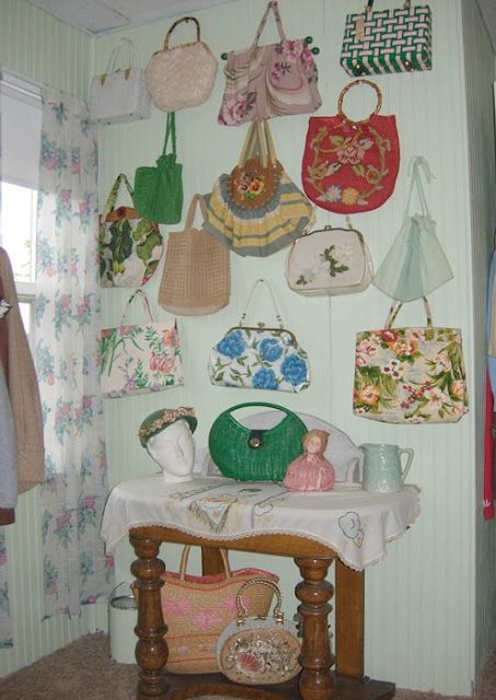 I love vintage bags.  In Virginia we called them pocketbooks, but in Texas we call them purses.  Whatever you call them...I call them CUTE.  Love them displayed as art.  Great way to show off and use your collection.  I particularly love the Green Basket Purse at the bottom. Vintage Clothing Display, Vintage Toy Display, Purse Display, Handbag Display, Old Room, Bag Display, Beaded Evening Bags, Jersey Girl, Granny Chic