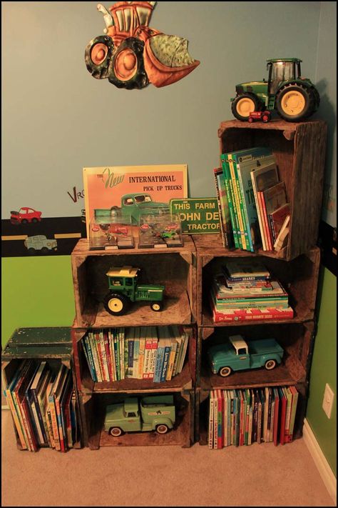 Crate Shelves - boys room. Finally found the perfect solution to store all of my boys books. Old wooden crates from a nearby vegetable farm. Love the colours and vintage look they have. The boys loved it too. Farm Boy Room, Tractor Bedroom, John Deere Room, Tractor Room, Farm Bedroom, Farm Room, Old Crates, Big Boy Bedrooms, Crate Shelves