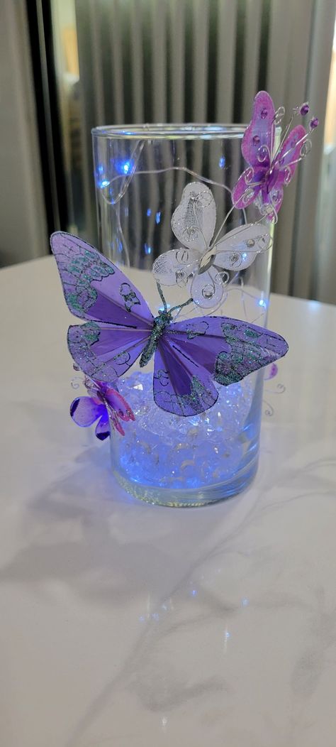 Purple Butterfly Centerpiece Ideas, Butterfly Centerpiece Ideas Diy, Girly Centerpieces, Butterfly Quinceanera Theme Centerpieces, Butterfly Centerpieces Quinceanera, Quinceanera Theme Butterflies, Butterfly Theme Quinceanera, Butterfly Quince Theme, Butterfly Quinceanera Theme