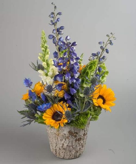 Even if the patient doesn’t have allergies to flowers, their doctors or nurses might! Be respectful of the fact that a lot of people come and go in hospital rooms. Choose hypo-allergenic blooms like the delphinium or bells of Ireland found in our Nature Walk Bouquet for a fresh design that won’t offend the senses. #CasasFlowerShops Sunflowers Roses, Bells Of Ireland, Walk In Nature, Sunflower Themed Wedding, Get Well Flowers, People Come And Go, Bee Garden, Order Flowers Online, Flowers Delivered