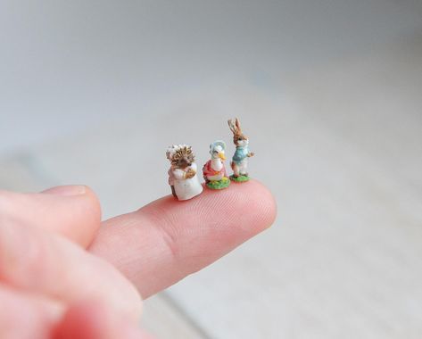 Miniature Beatrix Potter's characters, about 9mm tall. Made by hand from polymer clay :) ______________________ #miniatures #miniature… | Instagram Minature Sculpture Polymer Clay, Polymer Clay Miniatures Animals, Polymer Clay Miniatures Sculptures & Statues, Mini Clay Doll Accessories, Miniature Ceramic Animals, Dollhouse Miniatures Diy, Miniature Diy, Rilakkuma, Beatrix Potter