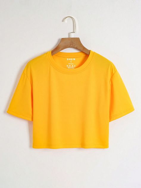 SHEIN EZwear Solid Crop TeeI discovered amazing products on SHEIN.com, come check them out! Fashion For Men Over 40, Plain Crop Tops, Polo Crop Top, Yellow Crop Top, Yellow Shirt, Yellow Outfit, Female Clothing, Yellow Shirts, Short Sleeve Cropped Top