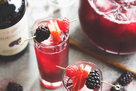 Boxed Wine Pitcher Cocktails: Red Wine, Blackberry & Ginger Cocktail | Kitchn Pitcher Recipes, Pomegranate Cocktail, Blackberry Cocktail, Batch Cocktail Recipe, Layered Cocktails, Pomegranate Cocktails, Boxed Wine, Wine Pitcher, Pineapple Mojito