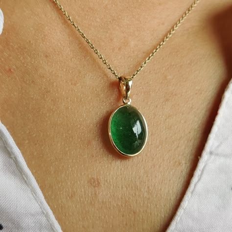 ITEM DESCRIPTION: >> The Pendant is made from Solid 14K Yellow Gold. Gemstone used is absolutely natural and ethically sourced. >> Natural Green Aventurine in oval shape and bezel setting is studded on it with utmost precision. >> This is a minimalist design and is absolutely hassle-free and everyday jewelry. Gem: Green Aventurine Gem size: 10x13 mm oval Gem weight: 6.21carats Gold purity: 14K (58.33% approx.) Gold weight: 0.49 grams Gross weight: 1.73 grams The Gold purity is guaranteed and it Olivine Jewelry, Green Gem Necklace, Green Gold Jewelry, Green Aventurine Jewelry, Aventurine Jewelry, Green Gem, Green Pendants, Symbolic Jewelry, May Birthstone