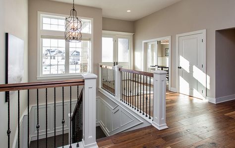 Dynasty Partners Homes custom built/designed light-filled entry way. #desmoines #design #interior #customhome #home Stairs To Basement In Living Room, Switchback Stairs, Stairs To Basement, Basement Stairway, Entryway Designs, Foyer With Stairs, Theater Rooms, Designer Kitchens, Basement Layout