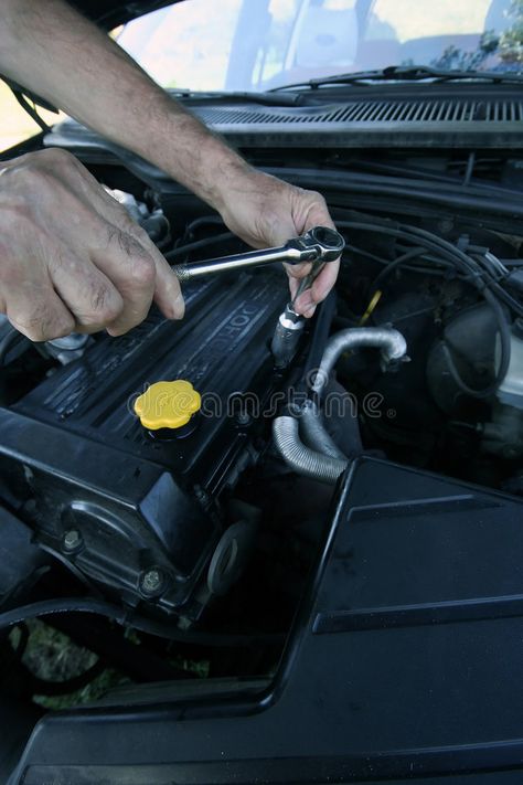 Mechanic. A mechanic' hand fixing a car engine , #SPONSORED, #hand, #mechanic, #Mechanic, #engine, #car #ad Mechanics Hands, Device Storage, New Photo Download, My Car, Car Engine, A Car, Free Stock Photos, Stock Images, Engineering