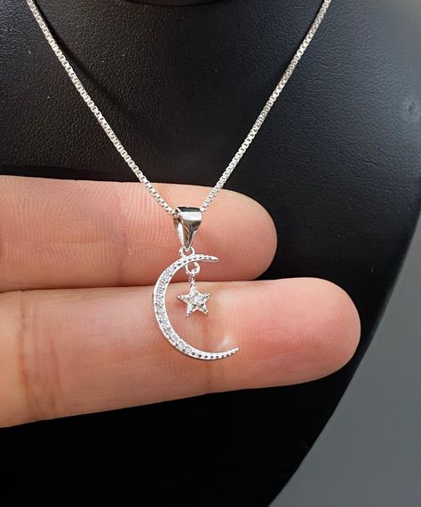 "Sterling Silver Small Moon and Star Charm Necklace Minimalist and Dainty Crescent Moon Necklace Metal: All components are made from solid .925 Sterling Silver Measurement: pendant height is 21mm (0.83 inches) including bail and 11mm (0.43\") wide Choose Chain Length At Checkout You can find other charm jewelry in my shop here https://www.etsy.com/shop/LinksAndStones?ref=seller-platform-mcnav&section_id=24389019 Please feel free to Convo me with any questions before purchasing. Please view p Moon Silver Necklace, Moon Star Necklace, Crescent Moon Necklace Silver, Moon And Star Necklace, November Birthstone Necklace, Star And Moon Necklace, Space Jewelry, Pretty Jewelry Necklaces, Moon And Star Ring