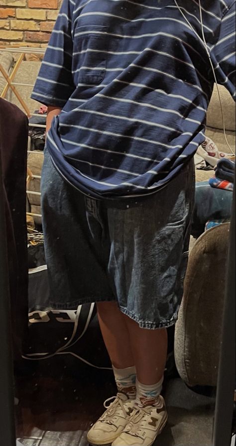 A person wearing a blue shirt with small green and white stripes right next to each other going in a horizontal direction with a pocket. Muted blue jorts with a tan belt. White mid length animal crossing socks. White and brown new balances Baggy 80s Outfit, Baggy Long Sleeve Shirt Outfit, Dadcore Fashion, Guy Fits Summer, Dad Clothes Aesthetic, 90s Baggy Style, Baggy Shorts Outfit, Baggy Shirt Outfit, Grunge Fashion Aesthetic