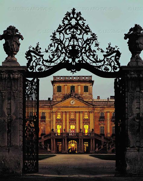 BAROQUE ARCHITECTURE 18TH   Entrance gate and palace of the princes Esterhazy in Eszterhaza, now Fertoed, Hungary. Joseph Haydn and the prince's orchestra used to spend the summer in Eszterhaza and return to Eisenstadt in autumn.   Eszterhaza Palace, Fertoed, Hungary Rococo Architecture, Dream Architecture, Hungarian Culture, Setting Inspiration, Entrance Gate, Awesome Architecture, Castle Mansion, Landlocked Country, Location Inspiration