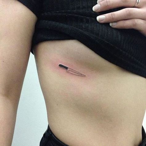 20 tiny tattoos perfect for underboobs   https://www.revelist.com/skin/tiny-tattoos-for-underboobs/11844 Tiny Knife Tattoo, Tiny Knife, Acab Tattoo, Underboob Tattoo Designs, Grunge Tattoo, Knife Tattoo, Underboob Tattoo, Stylish Tattoo, Shape Tattoo