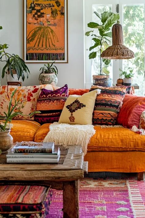 Explore modern boho chic living room ideas featuring natural textures, rattan furniture, and trendy decor in this inspiring image. Maximalist Boho Living Room, African Boho Living Room, Modern Boho Chic Living Room, Boho Chic Living Room Ideas, Chic Living Room Ideas, Statement Plants, Modern Bohemian Decor, Modern Boho Chic, Sleek Coffee Table