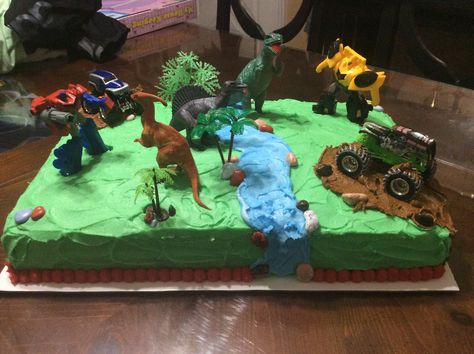 wanted transformers, dinosaurs and monster truck Jurassic Park Cake, Transformers Cake, Volcano Cake, Dino Cake, Truck Cake, Dinosaur Cake Toppers, Dinosaur Birthday Cakes, Truck Cakes, Monster Truck Party