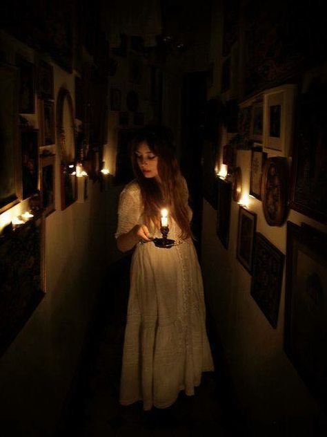 The light cleared her darkend path as she crep down the hall the hot wax fell on to her as she clucthed the candle for her life. She didnot know what she would do once she meet the causer of the mysterious noises she heard at entramce way. Candlelit Photoshoot, Dark Hallway, Light A Candle, Lady Macbeth, Gothic Romance, Mori Girl, Story Inspiration, Book Inspiration, The Darkness