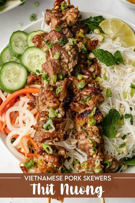 Thit Nuong, or Vietnamese Grilled BBQ Pork Skewers, is one of Vietnam's most popular dishes for a reason! Thinly sliced pork shoulder is coated in a lemongrass marinade for fresh & aromatic flavor. Though traditionally grilled, this easy recipe cooks the skewers in the oven for a simple, year-round favorite. Dairy free, healthy. Lemongrass Marinade, Skewers In The Oven, Bbq Pork Skewers, Thit Nuong Recipe, Vietnamese Grilled Pork, Pork Shoulder Recipes, Vietnamese Pork, Pork Skewers, Popular Dishes