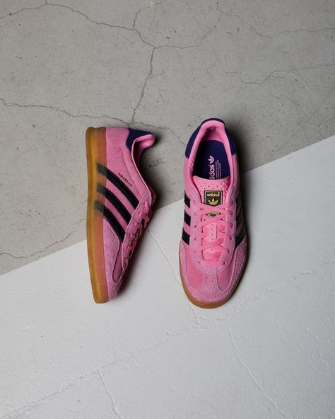 Like a dazzling dash of ruby light, the pink suede Gazelle Indoor from adidas Originals is a certified head-turner. Get yourself some authentic terrace good looks with our limited restock, available now at the link in bio. Adidas Gazelle Pink, Shoe Trends, Popular Sports, Best Sneakers, Pink Suede, Adidas Gazelle, Prada Shoes, Girls Best Friend, The Pink