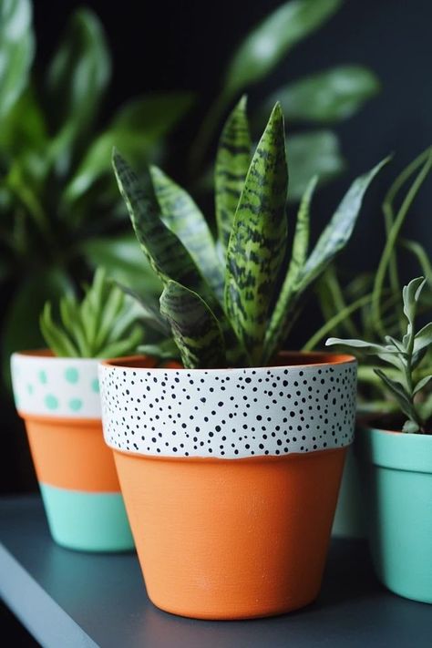 "Brighten up your garden with DIY Painted Terra Cotta Pots! 🎨🪴 Perfect for adding a splash of color to your plants. 🌟✨ #PaintedPots #DIYProjects #GardenDecor" Painted Flower Pots Aesthetic, Diy Painted Pots Ideas, Painting Terra Cotta Pots Ideas, Terracotta Pots Painted Diy, Painted Flower Pots Terra Cotta, Cute Planter Ideas, Painted Terra Cotta Pots Ideas, Painted Pots Diy Terra Cotta, Diy Painted Terra Cotta Pots