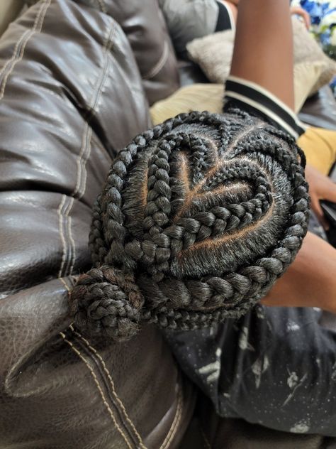 Double Heart Braids, Heart Braids For Men, How To Braid A Heart In Black Hair, Heart Shape Braids, Mens Bun, Heart Parts Braids, Heart Braids Men, Cornrow Hairstyles For Men Design, Heart Shaped Cornrows