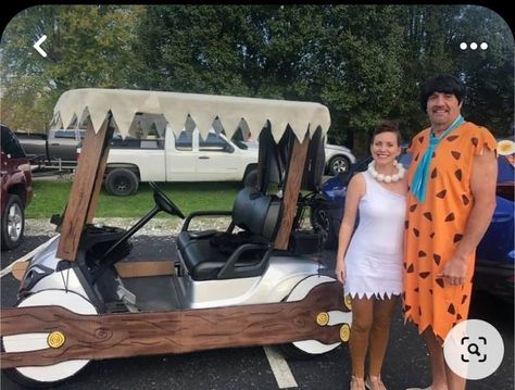 Golf Cart Flintstones, Family Halloween Costumes With Golf Cart, Decorating A Golf Cart For A Parade, Golfcart Decoration Ideas Halloween, Flintstones Golf Cart, Flintstones Golf Cart Decorations, Flinstones Golf Cart, Atv Decorations For Parade, Golf Cart Decorations Ideas