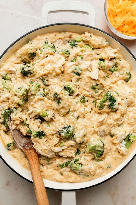 If you love our baked Chicken and Rice Casserole, then this is the easy dinner recipe for you! We've taken that classically good combination of cheese, chicken, broccoli, and rice that is so loved and turned it into a simple stovetop version made all in one skillet. Cheesy Chicken Skillet, Baked Chicken And Rice Casserole, Chicken Broccoli Rice Cheese Casserole, Chicken Rice Skillet, Cooked Rice Recipes, Baked Chicken And Rice, Broccoli And Rice, Chicken Broccoli Rice Casserole, Chicken Broccoli Rice