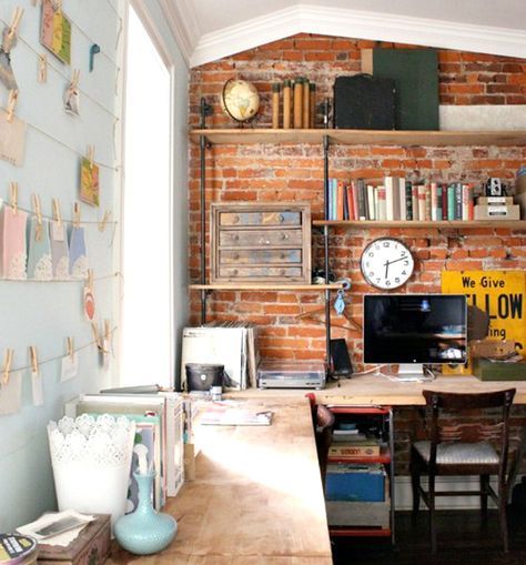 10 Ways to Decorate an Exposed Brick Wall Without Drilling | 6sqft Brick Wall Decor, Clothes Lines, Cozy Home Office, Modern Vintage Decor, Wall Bookshelves, Exposed Brick Walls, Exposed Brick, Diy Shelves, Home Office Design