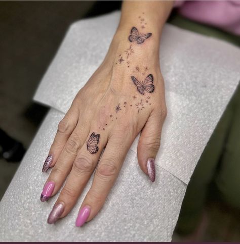 Butterfly Hand Tattoo With Sparkles, Whimsical Hand Tattoo, Fairy Hand Tattoo, Hand Tattoo Girl, Flowers Hand Tattoo, Cover Up Hand Tattoos, Butterfly Hand Tattoo For Women, Fingers Tattoos, Hand Tatts