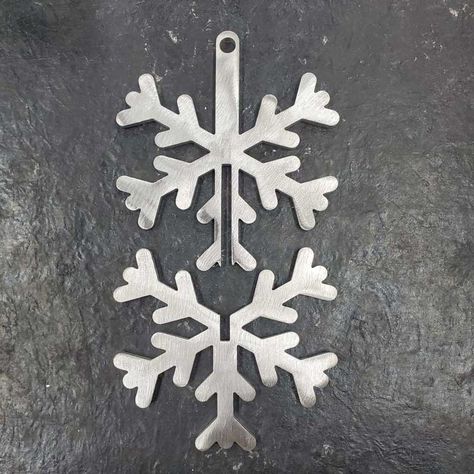 Select from four different designs that are made with U.S. 10 gauge steel. The Christmas tree and snowflake come as a DIY weld-together kit. All ornaments come as raw steel allowing you to finish them as you want. These ornaments make a great gift for the welder in your life. Buy them individually or get the whole set and save.Note: These come as raw unfinished steel.. #LaserCutDecor #DIYDecor #HomeDecor #CraftIdeas #LaserCutting #HandmadeDecor Cnc Ornaments Design, Sheet Metal Christmas Ornaments, Metal Plasma Ideas, Cnc Ornaments, Metal Snowflakes, Christmas Metal Art, Metal Christmas Decor, Metal Sign Ideas, Holiday Ornaments Diy