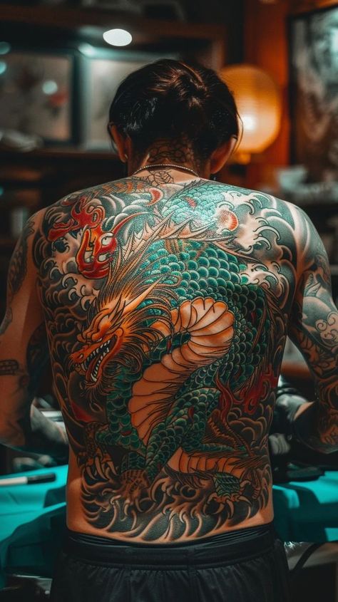 Japanese dragon full-back tattoo design with vibrant colors and intricate details, showcasing the artist's skill. Japanese Snake Tattoo, Japanese Tattoos For Men, Fierce Dragon, Dragon Tattoos For Men, Japanese Dragon Tattoo, Japanese Dragon Tattoos, Full Back Tattoos, Dragon Skin, Back Tattoos For Guys