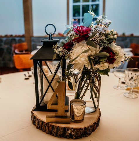 Fall Wedding Lanterns, Tall Fall Centerpieces Wedding, Lantern Wedding Centerpieces, Fall Lantern Centerpieces, Decor With Lanterns, Fall Wedding Table Numbers, Fall Wedding Table Decor, Lantern With Fairy Lights, Warm Wood Tones