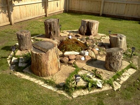 Homemade fire pit from rocks and tree stumps for stools. Yarning Circle, Homemade Fire Pit, Bonfire Pits, Fire Pit Landscaping, Tree Stumps, Rustic Planters, Fire Pit Area, Wood Logs, Backyard Fire