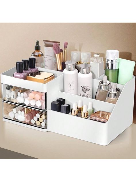 Product Description 1. HIGH QUALITY - The makeup organizer is made of plastic material, compact and simple design, does not deform, and is shiny. It is very suitable to be placed on the bedroom dressing table, bathroom sink and office desktop. 2. PERFECT SIZE - 11.2''L x 6.7"W x 4.7"H.The vanity organizer has 8 compartments and two small clear drawers that can be drawn smoothly. Keep your small items clean and tidy to prevent dust. 3. CLASSIFIED STORAGE - The design of multiple compartments and drawers makes it a perfect cosmetic storage box for storing lotion, essence, facial cleanser, lipsticks, makeup palettes, eye shadows, concealers, makeup brushes and other skin care products, cosmetics, and toiletries. 4. EXCELLENT CHOICE AS GIFT - Perfect choice as a gift to girlfriend, daughter, w Makeup Desk Ideas Organizations, Makeup Storage For Bathroom, Shelves For Makeup, Bathroom Makeup Organization, Organizing Vanity, Makeup Holder Organizers, Skin Care Organizer, Makeup Organizer Ideas, Lotion Organization