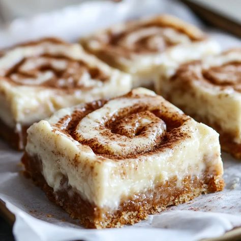 Blender Cinnamon Roll Cheesecake Bars Cinnamon Bars With Cream Cheese Frosting, Cinnamon Cheesecake Bars Crescent Rolls, Blender Cinnamon Roll Cheesecake Bars, Cinnamon Swirl Cheesecake Bars, Cinnamon Roll Crust Cheesecake, Cheesecake Cinnamon, Cinnamon Roll Crust, Cinnamon Bars, Cinnamon Roll Cheesecake