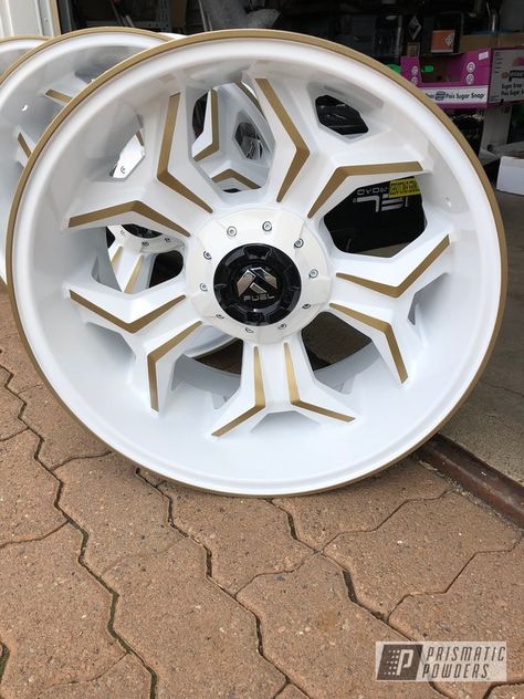 Powder Coated in POLY GOLD and CLOUD WHITE. See more of THE POWDERCOAT COMPANY projects at PrismaticPowders.com along with 1,000’s of other Powder Coating colors. Powder Coating Wheels, White Wheels, Custom Wheels Cars, Custom Rims, Jimny Suzuki, White Jeep, Tacoma Truck, Off Road Wheels, Fuel Wheels