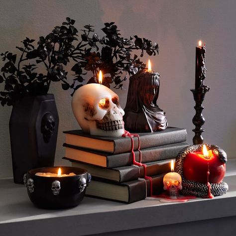 Take your Halloween decor from haunted to hauntingly beautiful! Our Southern Gothic Black Boxwood Stem, standing at an impressive 25.5 in., is perfect for adding a touch of eerie elegance to your seasonal arrangements. Crafted from plastic, this timeless piece is versatile enough to complement any spooky setup. Its black color brings a dramatic effect that pairs wonderfully with other Halloween decorations or even as a standalone statement. The boxwood type greenery breathes life into any vignet House Room Design, Halloween Living Room Decor, Halloween Living Room, Led Candle Decor, Coffee Wall Decor, Apple Candles, Halloween Centerpiece, Skull Candle, Cross Wall Decor