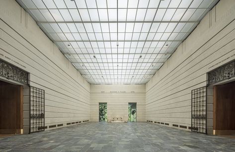 A room with stone walls with horizontal blocks, two open entryways on the far wall, and wide doors with iron ornamentation and gates on either side. Open Entryway, Seattle Wedding Venues, Garden Court, Washington Wedding Venues, Seattle Art Museum, Museum Interior, Seattle City, Asian Art Museum, Seattle Art