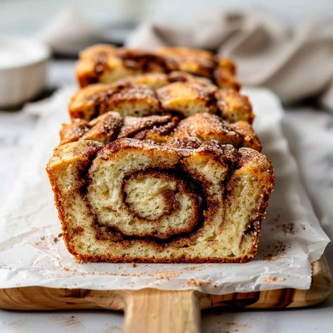 This cinnamon swirl quick bread is the perfect anytime treat! With hints of vanilla and warm cinnamon, it's a classic flavor combo no one can resist. Cinnamon Crumb Bread, Cinnamon Strudel Bread, Buttermilk Cinnamon Bread, Cinnamon Swirl Quick Bread, Cinnamon Raisin Bread Recipe, Cinnamon Loaf, Cinnamon Roll Bread, Rolls Homemade, Coffee Cake Recipes Easy